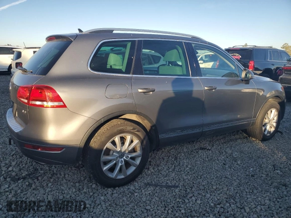 2013 Volkswagen Touareg Lux with VIN WVGEF9BPXDD002285, listed as a Copart auction lot 82248604 with 150,780 mi miles and Salvage Title. Bid and sale history available at DreamBid. Image 3.