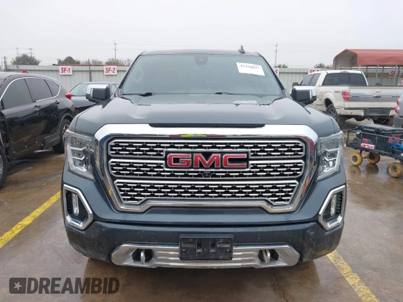 2020 GMC Sierra 1500 Denali z VIN 1GTU9FEL1LZ120581, wystawiony jako IAAI lot #41428827 z przebiegiem 97 917 mil mil oraz . Historia ofert i sprzedaży dostępna na DreamBid. Obrazek 12.