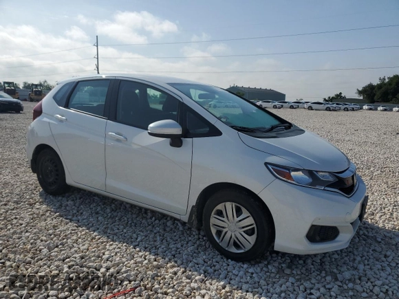 2019 Honda Fit LX with VIN 3HGGK5H48KM737557, listed as a Copart auction lot 55716935 with 123,210 mi miles and Salvage title. Bid and sale history available at DreamBid. Image 4.