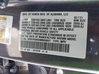 2021 Honda Pilot Touring 8-Passenger z VIN 5FNYF6H9XMB059037, wystawiony jako IAAI lot #42202410 z przebiegiem 49 267 mil mil oraz . Historia ofert i sprzedaży dostępna na DreamBid. Obrazek 9.