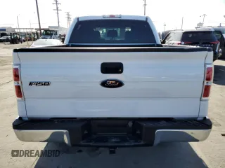 2014 Ford F-150 XL with VIN 1FTFW1CT1EKE22892, listed as a Copart auction lot 61635265 with 14,203 mi miles and Salvage title. Bid and sale history available at DreamBid. Image 6.