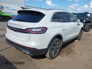 2022 Lincoln Nautilus Reserve z VIN 2LMPJ6K96NBL09228, wystawiony jako IAAI lot #42233979 z przebiegiem 39 770 mil mil oraz . Historia ofert i sprzedaży dostępna na DreamBid. Obrazek 4.