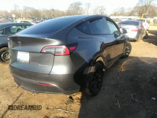 2022 Tesla Model Y Long Range with VIN 7SAYGDEE9NF424928, listed as a IAAI auction lot 41807225 with Not Provided miles and . Bid and sale history available at carsss.com. Image 4.