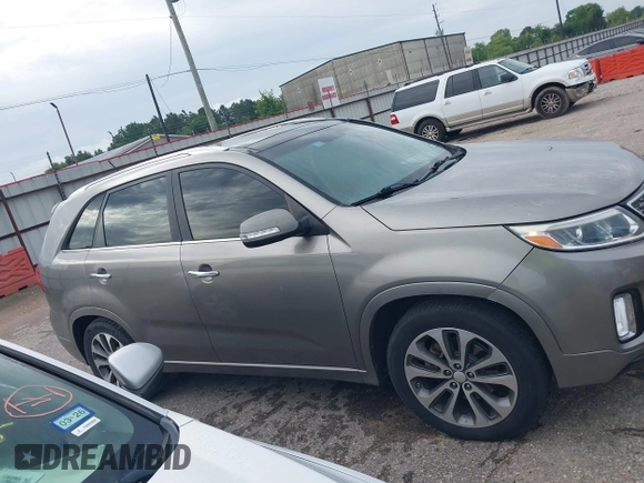 2014 Kia Sorento SX Limited with VIN 5XYKW4A73EG503792, listed as a IAAI auction lot 42684390 with 129,021 mi miles and . Bid and sale history available at DreamBid. Image 13.