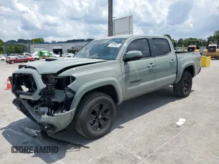 2023 Toyota Tacoma SR with VIN 3TMCZ5ANXPM591178, listed as a Copart auction lot 62659685 with 26,303 mi miles and Salvage title. Bid and sale history available at DreamBid. Image 1.