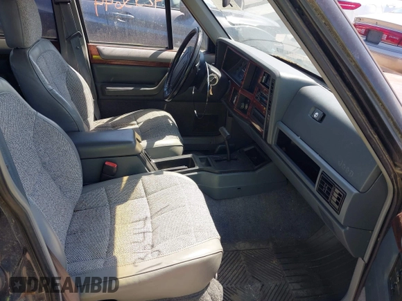1995 Jeep Cherokee Country z VIN 1J4FJ78S9SL666002, wystawiony jako IAAI lot #42313644 z przebiegiem 226 914 mil mil oraz . Historia ofert i sprzedaży dostępna na DreamBid. Obrazek 5.