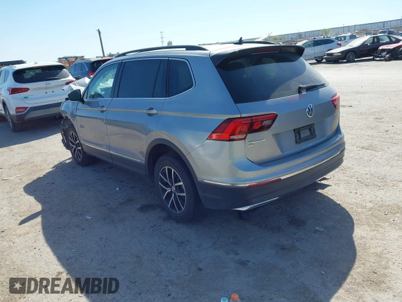2021 Volkswagen Tiguan SE with VIN 3VV3B7AXXMM116774, listed as a IAAI auction lot 41868796 with Not Provided miles and . Bid and sale history available at DreamBid. Image 3.