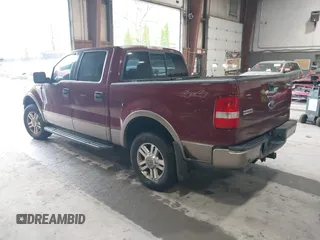 2004 Ford F-150 XLT with VIN 1FTPW14564KD79671, listed as a IAAI auction lot 42166489 with 205,083 mi miles. Bid and sale history available at carsss.com. Image 3.