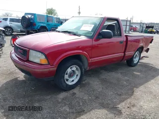 1999 GMC Sonoma with VIN 1GTCS1443X8530274, listed as a IAAI auction lot 41937187 with 210,244 mi miles. Bid and sale history available at carsss.com. Image 2.