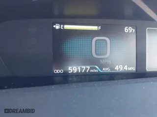 2021 Toyota Prius L Eco with VIN JTDKAMFU9M3150667, listed as a IAAI auction lot 41609328 with 59,177 mi miles. Bid and sale history available at carsss.com. Image 16.