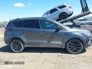 2017 Ford Escape SE with VIN 1FMCU0G92HUF10596, listed as a IAAI auction lot 42038215 with 145,735 mi miles. Bid and sale history available at carsss.com. Image 13.