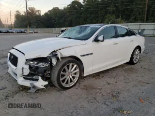 2019 Jaguar XJ R-Sport with VIN SAJWA1C73K8W19459, listed as a Copart auction lot 77334704 with 33,314 mi miles and Salvage title. Bid and sale history available at DreamBid. Image 1.