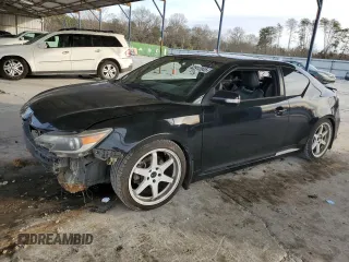 2014 Scion tC with VIN JTKJF5C73E3075721, listed as a Copart auction lot 42912045 with 138,264 mi miles and Salvage Title. Bid and sale history available at carsss.com. Image 1.