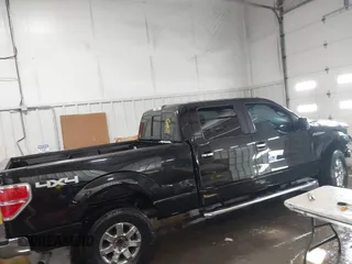 2014 Ford F-150 XL with VIN 1FTFW1EF9EKF23024, listed as a IAAI auction lot 41286621 with 201,444 mi miles. Bid and sale history available at carsss.com. Image 14.