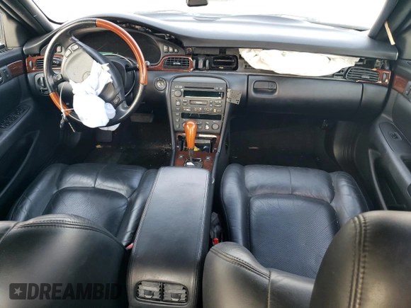 2001 Cadillac Seville Touring STS z VIN 1G6KY549X1U282930, wystawiony jako Copart lot #72750504 z przebiegiem Nie podano mil oraz Szkoda całkowita • Salvage title. Historia ofert i sprzedaży dostępna na DreamBid. Obrazek 8.
