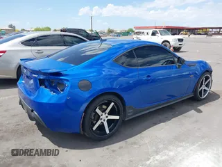 2013 Subaru BRZ Limited with VIN JF1ZCAC14D1604424, listed as a IAAI auction lot 42027795 with 89,269 mi miles. Bid and sale history available at carsss.com. Image 4.
