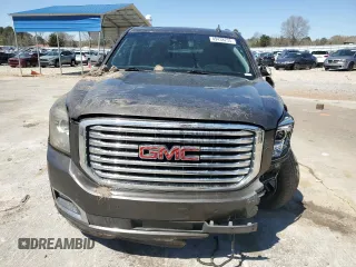 2019 GMC Yukon SLT with VIN 1GKS1BKC1KR117730, listed as a Copart auction lot 49438235 with 147,347 mi miles and Salvage Title. Bid and sale history available at carsss.com. Image 5.
