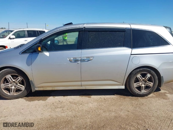 2013 Honda Odyssey Touring with VIN 5FNRL5H93DB076463, listed as a IAAI auction lot 41819994 with 188,911 mi miles. Bid and sale history available at carsss.com. Image 14.