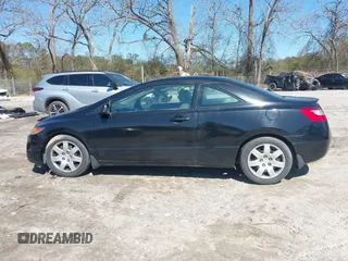 2009 Honda Civic Cpe LX with VIN 2HGFG12669H509744, listed as a IAAI auction lot 41777731 with 202,530 mi miles. Bid and sale history available at carsss.com. Image 13.