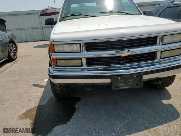 1999 Chevrolet C/K 2500 with VIN 1GCGK29R2XF094752, listed as a Copart auction lot 66548124 with 164,155 mi miles and Salvage Title. Bid and sale history available at carsss.com. Image 10.