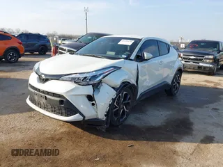 2021 Toyota C-HR LE with VIN JTNKHMBXXM1099019, listed as a IAAI auction lot 41525170 with 63,519 mi miles. Bid and sale history available at carsss.com. Image 17.