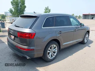 2019 Audi Q7 Premium with VIN WA1AAAF73KD031616, listed as a IAAI auction lot 39952592 with 60,839 mi miles and . Bid and sale history available at DreamBid. Image 4.