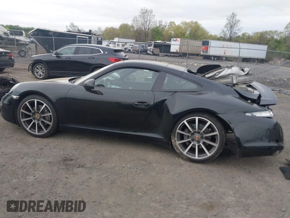 2014 Porsche 911 Carrera with VIN WP0AA2A92ES106536, listed as a IAAI auction lot 42048411 with 108,216 mi miles and . Bid and sale history available at DreamBid. Image 14.