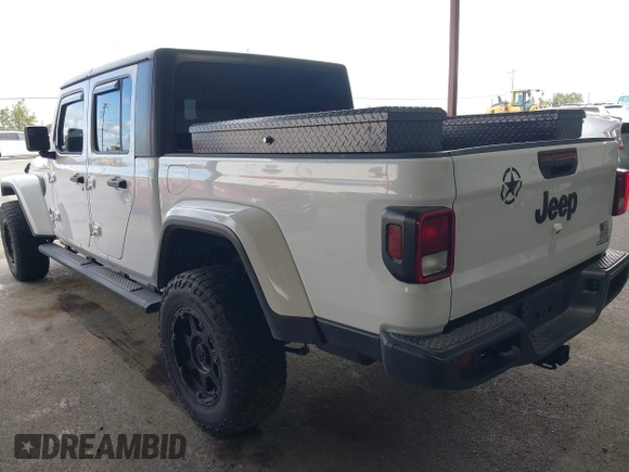 2021 Jeep Gladiator Willys with VIN 1C6HJTAG0ML505674, listed as a IAAI auction lot 42249317 with 60,150 mi miles and . Bid and sale history available at DreamBid. Image 3.