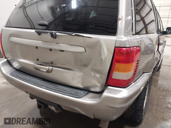 1999 Jeep Grand Cherokee Limited with VIN 1J4GW68N7XC752314, listed as a IAAI auction lot 41776905 with 228,023 mi miles. Bid and sale history available at carsss.com. Image 18.