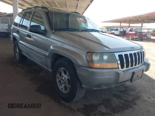 1999 Jeep Grand Cherokee Laredo z VIN 1J4G258S7XC679151, wystawiony jako IAAI lot #42500706 z przebiegiem Nie podano mil oraz . Historia ofert i sprzedaży dostępna na DreamBid. Obrazek 1.