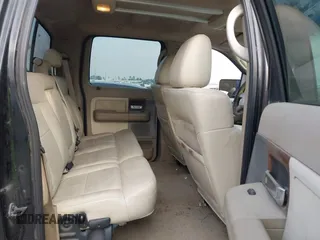2004 Ford F-150 XLT with VIN 1FTPW14554KC93459, listed as a IAAI auction lot 41673091 with 239,519 mi miles. Bid and sale history available at carsss.com. Image 8.