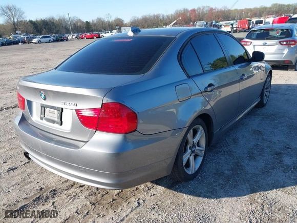 2011 BMW 3 Series 328i with VIN WBAPH5G5XBNM75907, listed as a IAAI auction lot 42002821 with 204,122 mi miles. Bid and sale history available at carsss.com. Image 4.