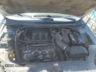 2008 Ford Taurus SEL z VIN 1FAHP24W78G119066, wystawiony jako Copart lot #57571895 z przebiegiem 231 039 mil mil oraz Tytuł czysty. Historia ofert i sprzedaży dostępna na DreamBid. Obrazek 11.