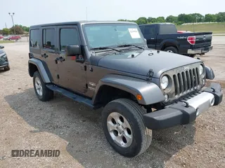 2014 Jeep Wrangler Unlimited Sahara with VIN 1C4BJWEG8EL285843, listed as a IAAI auction lot 42399090 with Not provided miles and . Bid and sale history available at DreamBid. Image 1.