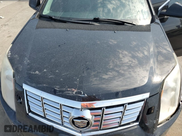 2014 Cadillac SRX Premium Collection with VIN 3GYFNDE35ES591071, listed as a Copart auction lot 57891265 with 134,560 mi miles and Salvage title. Bid and sale history available at DreamBid. Image 12.