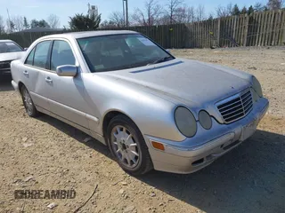 2000 Mercedes-Benz E-Class with VIN WDBJF65J1YB109587, listed as a IAAI auction lot 41842872 with 176,708 mi miles. Bid and sale history available at carsss.com. Image 1.