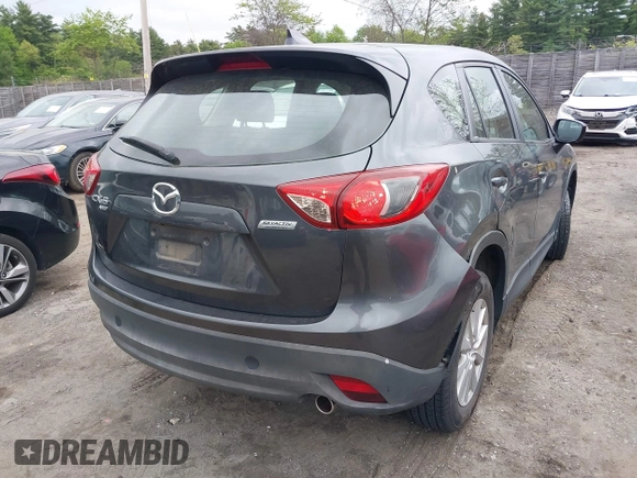 2016 Mazda CX-5 Sport with VIN JM3KE4BY9G0710004, listed as a IAAI auction lot 42323434 with 83,320 mi miles and . Bid and sale history available at DreamBid. Image 4.