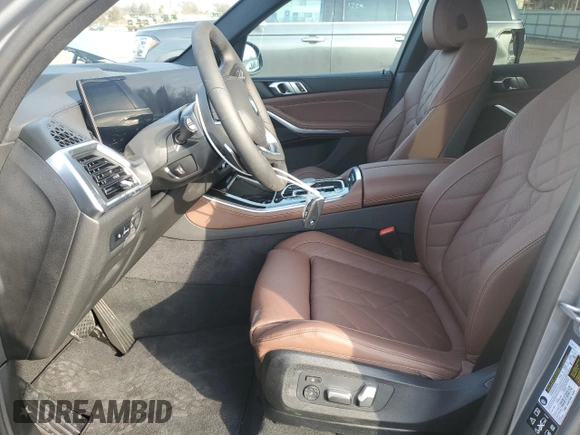 2025 BMW X5 xDrive40i with VIN 5UX23EU01S9Z44555, listed as a Copart auction lot 48656295 with 90 mi miles and Salvage Title. Bid and sale history available at carsss.com. Image 7.
