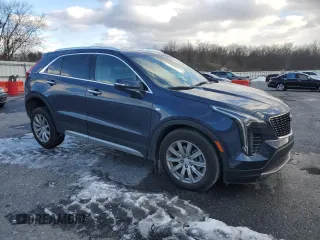 2021 Cadillac XT4 AWD Premium Luxury with VIN 1GYFZDR4XMF007080, listed as a Copart auction lot 87943335 with 36,379 mi miles and Salvage Title. Bid and sale history available at carsss.com. Image 4.