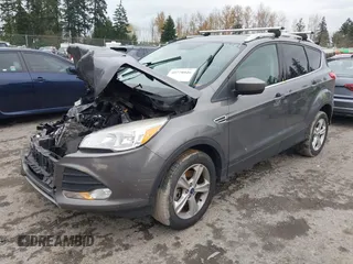 2013 Ford Escape SE with VIN 1FMCU9G92DUA54761, listed as a IAAI auction lot 41105062 with 131,767 mi miles. Bid and sale history available at carsss.com. Image 2.