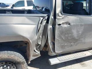 2014 Chevrolet Silverado 1500 LT with VIN 3GCPCREC0EG168589, listed as a IAAI auction lot 42001234 with 133,880 mi miles and . Bid and sale history available at DreamBid. Image 6.