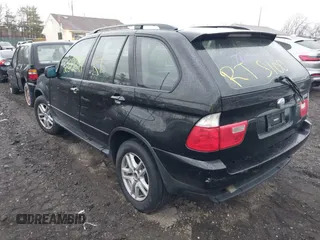 2004 BMW X5 3.0i with VIN 5UXFA13564LU31014, listed as a IAAI auction lot 41848344 with 999,999 mi miles. Bid and sale history available at carsss.com. Image 3.