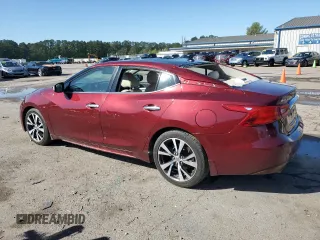 2017 Nissan Maxima SL with VIN 1N4AA6AP1HC370390, listed as a Copart auction lot 52683855 with 156,933 mi miles and Salvage title. Bid and sale history available at DreamBid. Image 2.