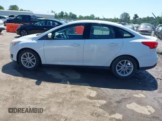 2018 Ford Focus SE with VIN 1FADP3F20JL234829, listed as a IAAI auction lot 42546330 with 101,713 mi miles and . Bid and sale history available at DreamBid. Image 14.