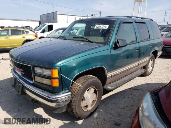 1998 GMC Yukon with VIN 1GKEK13RXWJ723572, listed as a Copart auction lot 65987314 with 237,503 mi miles and Salvage Title. Bid and sale history available at carsss.com. Image 1.
