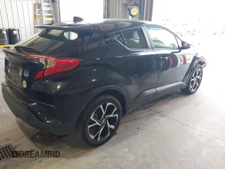 2020 Toyota C-HR LE with VIN JTNKHMBX1L1077957, listed as a IAAI auction lot 42159765 with 83,138 mi miles and . Bid and sale history available at DreamBid. Image 4.
