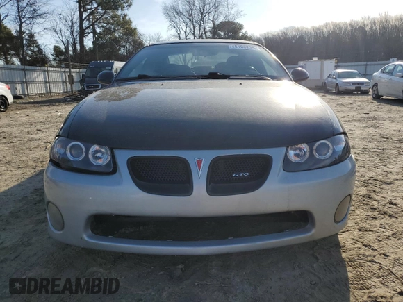 2004 Pontiac GTO z VIN 6G2VX12G74L249425, wystawiony jako Copart lot #48103235 z przebiegiem 106 334 mil mil oraz Szkoda całkowita • Salvage title. Historia ofert i sprzedaży dostępna na DreamBid. Obrazek 5.