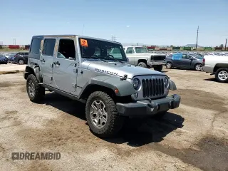 2014 Jeep Wrangler Unlimited Rubicon with VIN 1C4HJWFG1EL241014, listed as a Copart auction lot 63948655 with 165,650 mi miles and Salvage title. Bid and sale history available at DreamBid. Image 13.