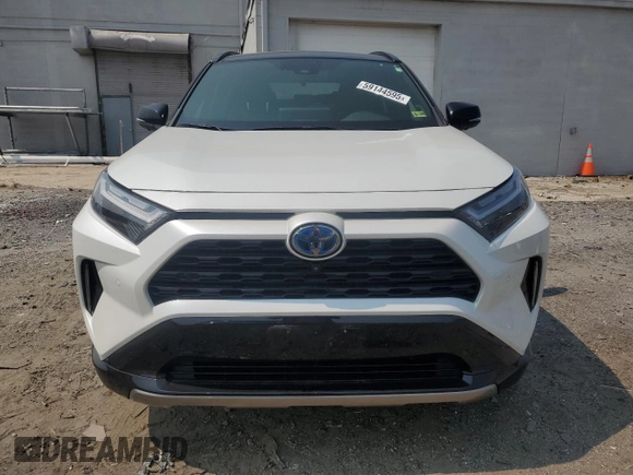 2023 Toyota RAV4 Hybrid XSE with VIN JTME6RFV7PD542467, listed as a Copart auction lot 59144595 with 18,943 mi miles and Salvage title. Bid and sale history available at DreamBid. Image 5.