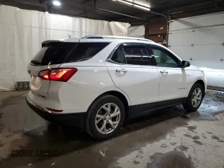 2018 Chevrolet Equinox Premier with VIN 2GNAXVEV4J6228214, listed as a Copart auction lot 51089315 with 70,451 mi miles and Salvage Title. Bid and sale history available at DreamBid. Image 3.